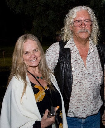 Dr. debi Story Maddox with Arlo Guthrie